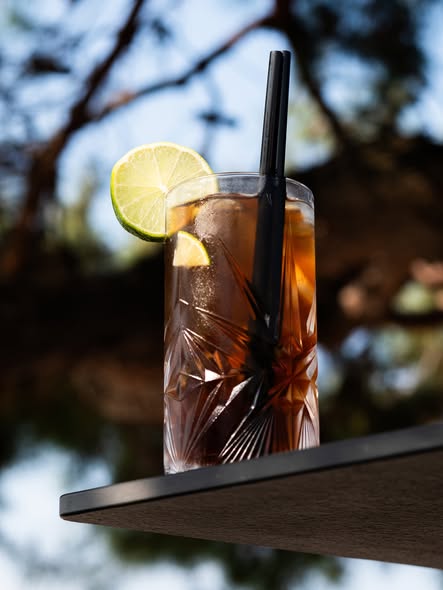 Sunset cocktail by the sea