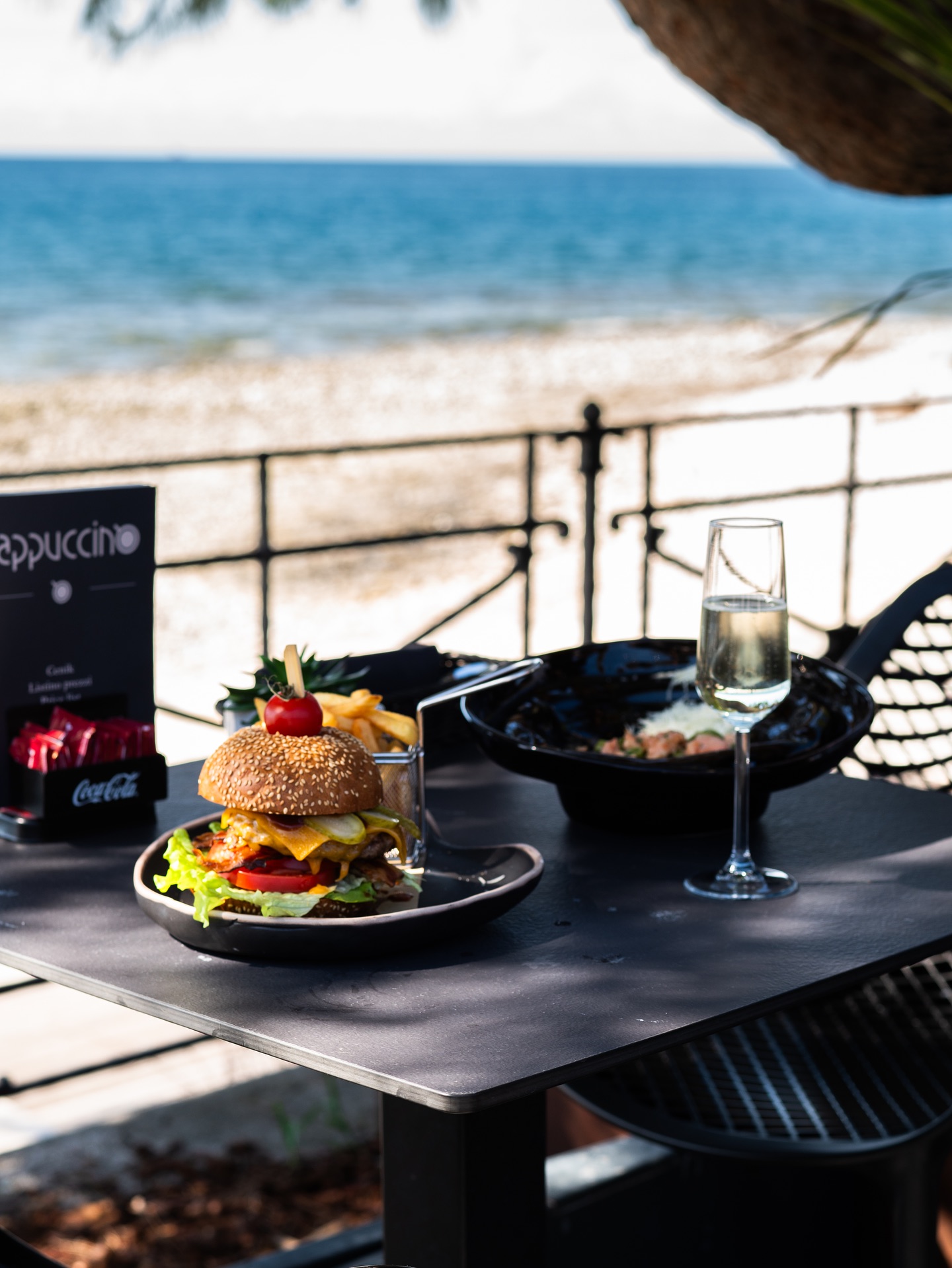 Burger and champagne on the terrace